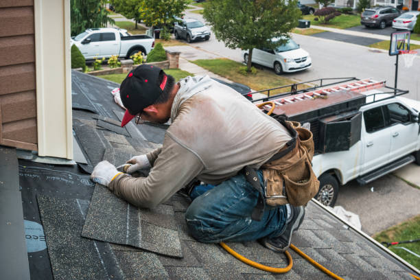Professional Roofing technician working in Winchester, MA